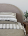 Tess and Tess Stripe reversible linen duvet cover, pillowcases, mossy green and ivory hues
