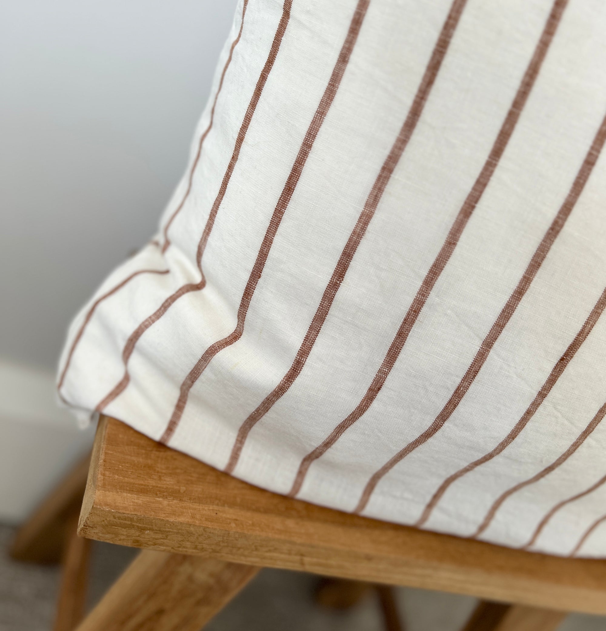 Caramel stripe linen cushion