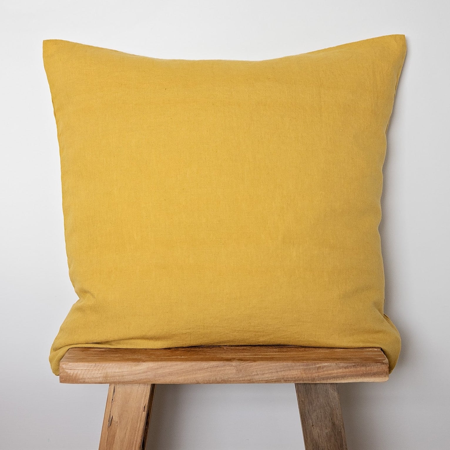 ochre linen cushion cover