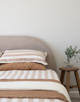 Hazelnut Stripe reversible linen bedding with Sol throw and Hazelnut linen pillowcases 