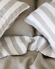 Tess and Tess Stripe linen bedding, reversible, mossy green and ivory 